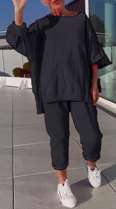 Erica | Rundhalsausschnitt mit Schlitz. Fluoreszierender Freizeitanzug für Damen