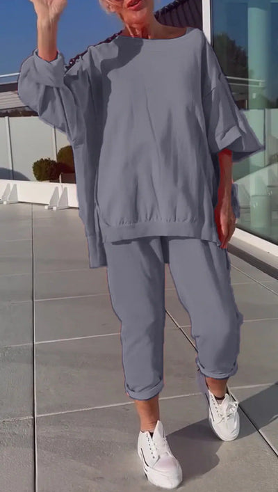 Erica | Rundhalsausschnitt mit Schlitz. Fluoreszierender Freizeitanzug für Damen