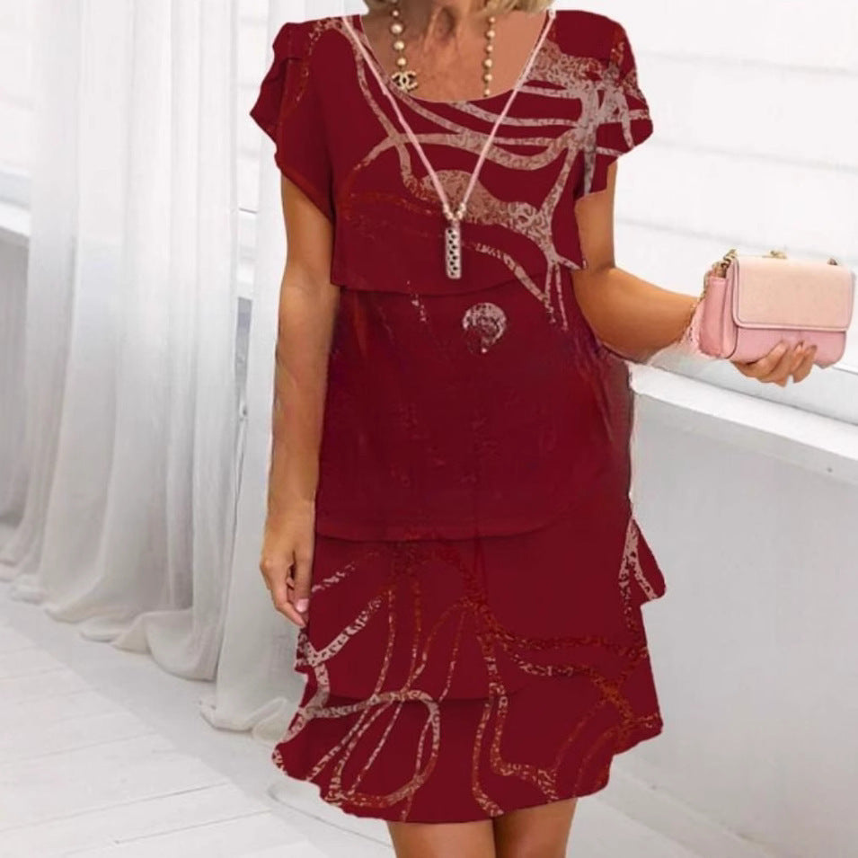 Damen Fließendes Maxi-Kleid mit eleganten Volant-Details und kreativem Grafikmuster Fudus