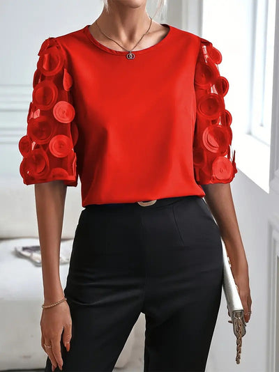 Damen modische Bluse mit transparenten Puffärmeln und runden Applikationen Fudus