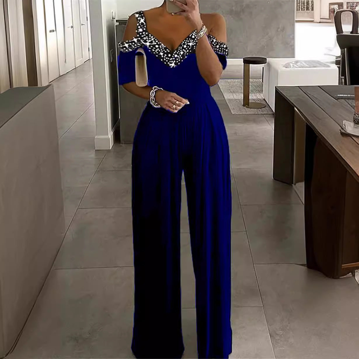Damen Elegantes Jumpsuit mit Off-Shoulder Design und Glitzerakzenten Fudus