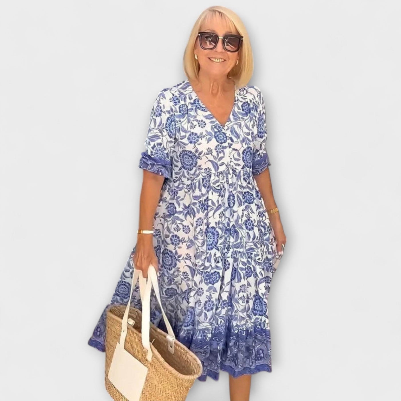 Caitlin - Anmutiges Blumenkleid mit einem luftigen Design