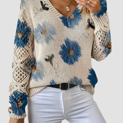 Damenpullover mit Blumenmuster und Häkel-Details