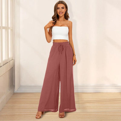 Carolyn | Weite Damenhosen mit hoher Taille und weiten Beinen mit Taschen