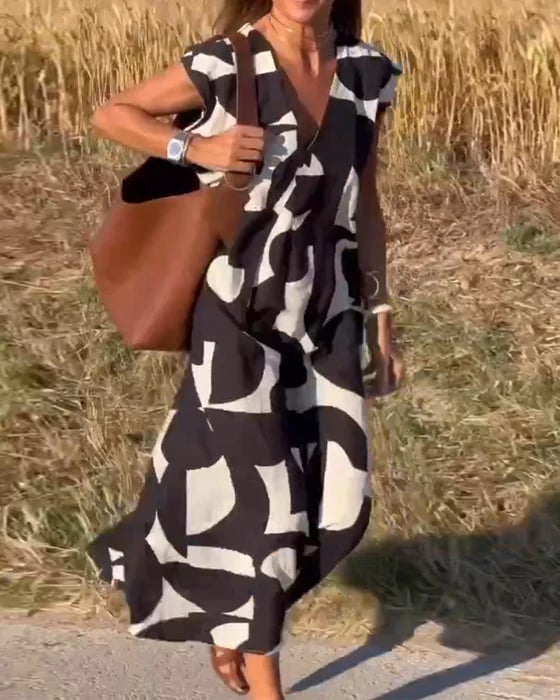 Philipha | V-Ausschnitt bedrucktes ärmelloses Kleid