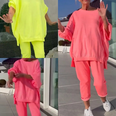 Erica | Rundhalsausschnitt mit Schlitz. Fluoreszierender Freizeitanzug für Damen