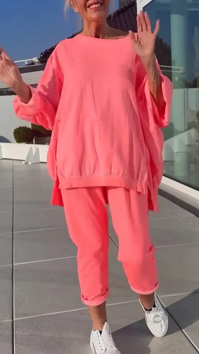 Haleigh | Rundhalsausschnitt mit Schlitz. Fluoreszierender Freizeitanzug für Damen